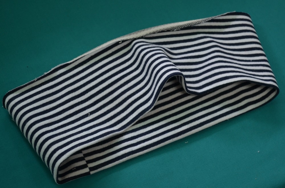 Folding circular stripe together in half