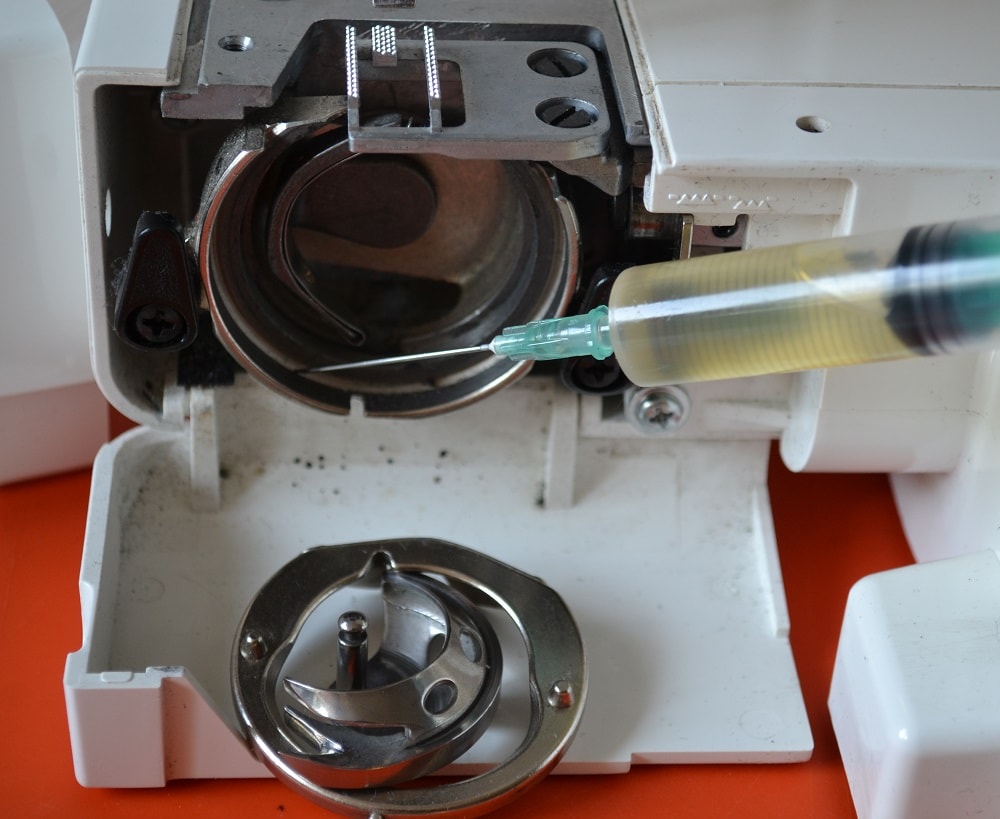 Lubrication a sewing machine with medical syringe