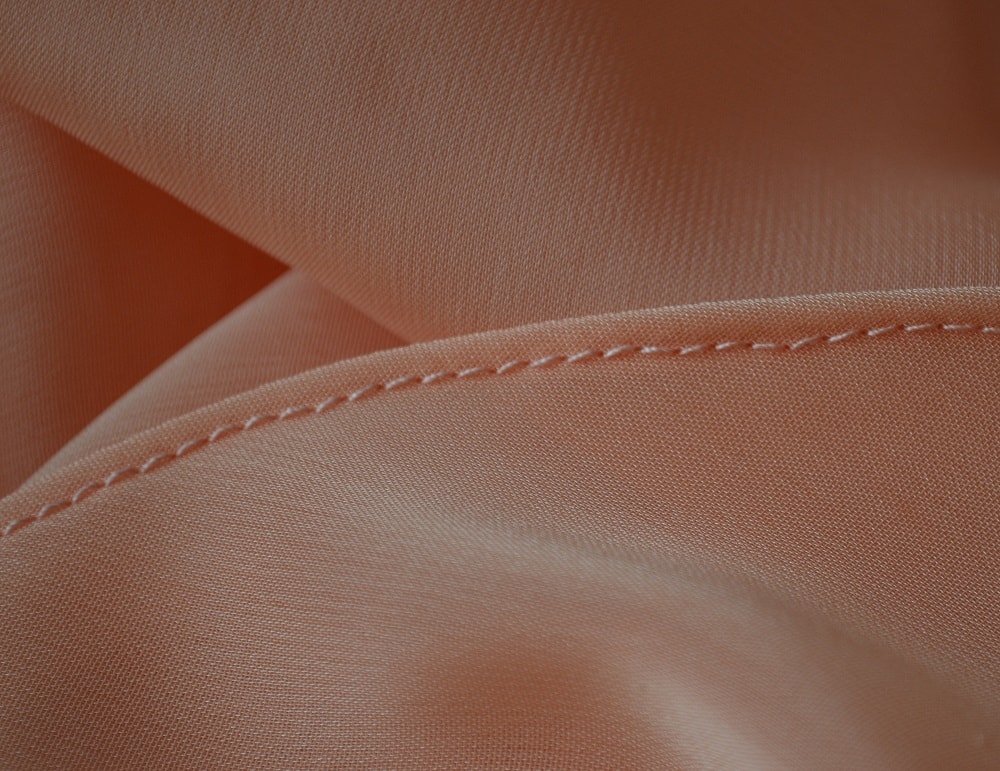 The hem on the right side of the fabric