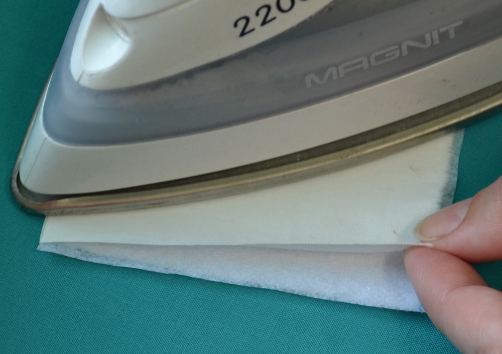 Press fusible interfacing on fabric