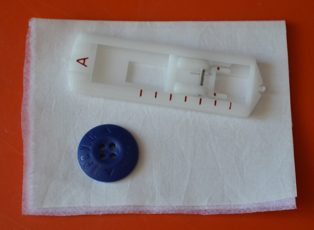 The presser foot to sew four steps buttonhole