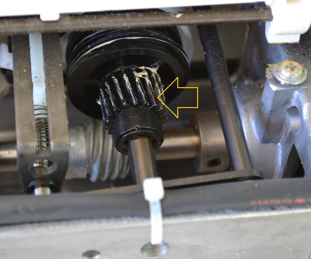Screws holding gears of shuttle hook