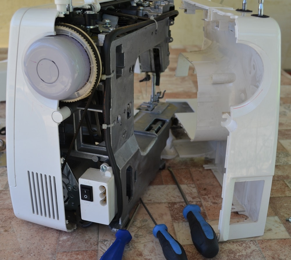 Two halves of the plastic body of the machine