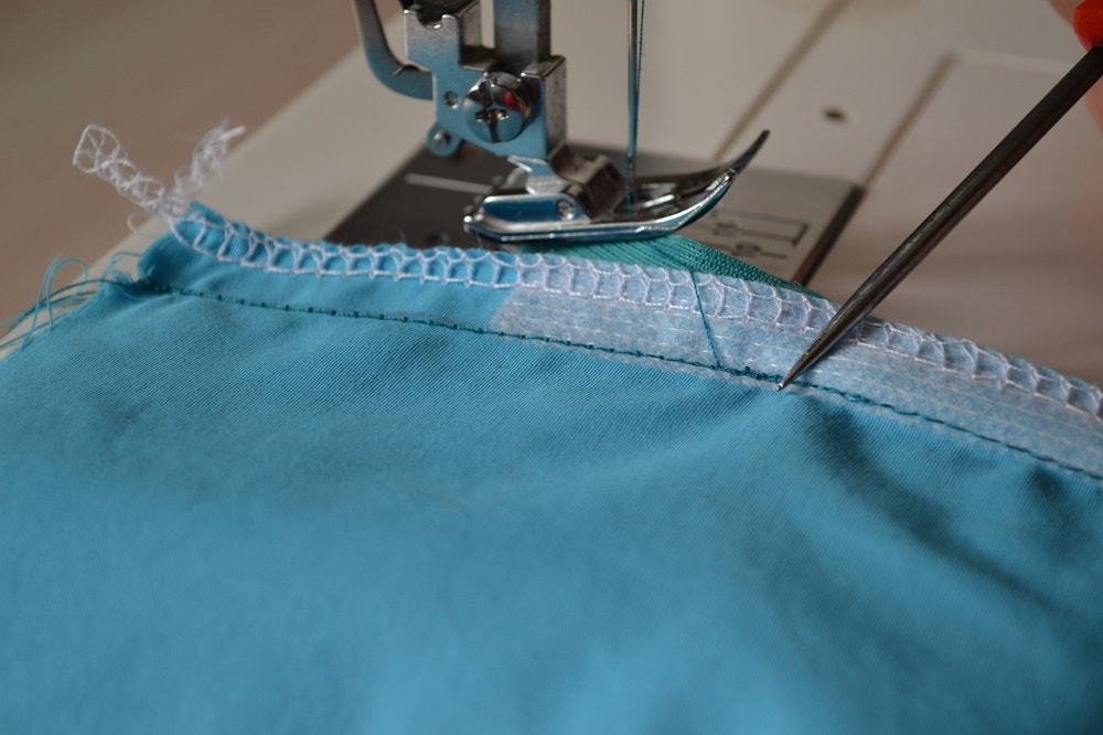 Remove the fabric from sewing machine